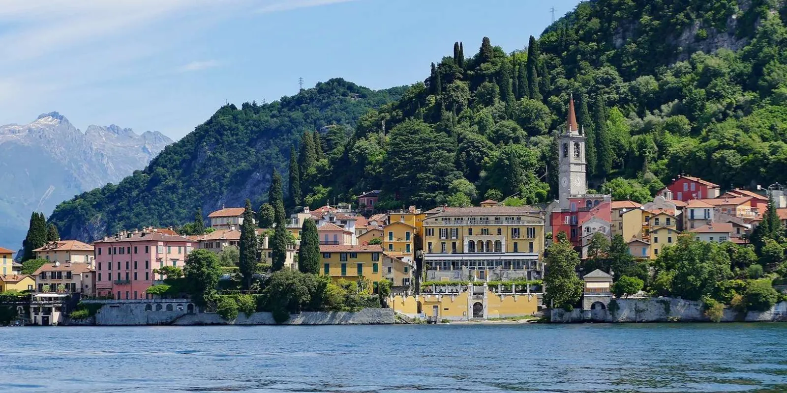 Varenna seen from the lake, the campanile rising above the coloured houses on the shore